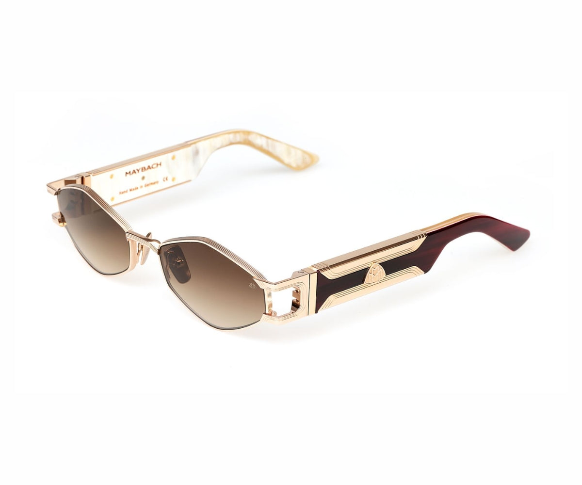 Luxury Maybach sunglasses with gold frame, brown gradient lenses, and tortoiseshell temples