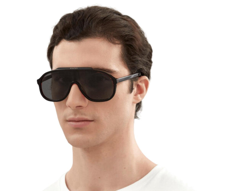 Gucci_Sunglasses_1038S_001_99_Model 1