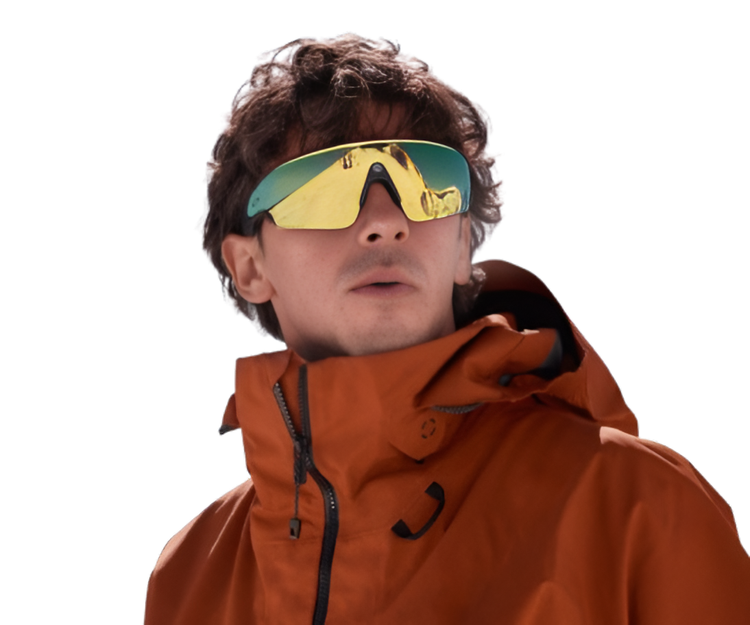 Man wearing yellow-tinted sport sunglasses with orange jacket, ideal for outdoor adventures and snow sports.