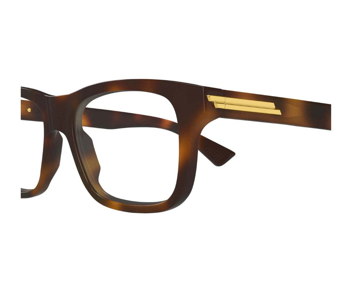 Tortoiseshell square designer glasses with gold temple accents, luxury eyewear style
