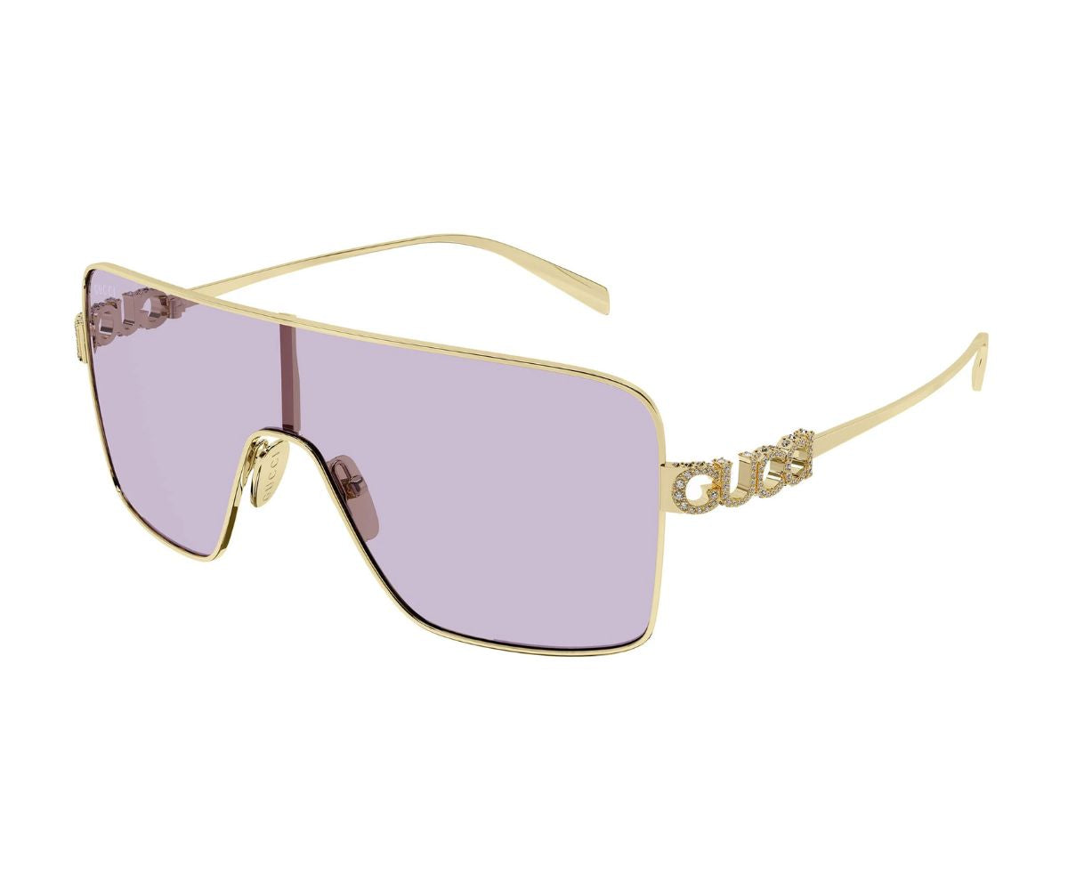 Gold Gucci sunglasses with lavender lenses and crystal logo arms, luxury designer eyewear