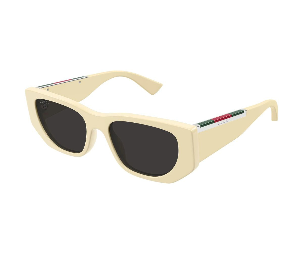 Cream Gucci sunglasses with green-red-green stripe, designer luxury frames, dark lenses