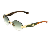 Luxury rimless sunglasses with gold accents and gradient green lenses, designer frames for men and women view 1